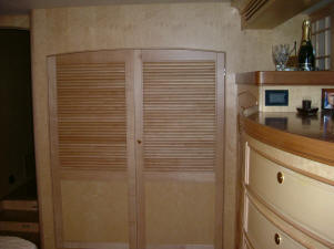 Laundry hidden behind Louvered doors